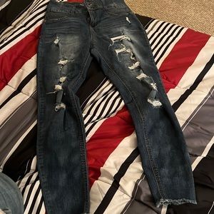 super cute dark blue skinny jeans . with cute patched holes .size 11